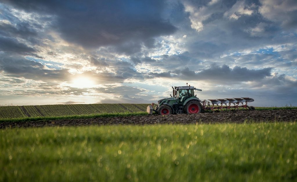 tractor, plough, agriculture, field, farm, farmland, farming, machinery, plantation, cultivation, arable land, sky, clouds, landscape, nature, mood, tractor, tractor, tractor, tractor, tractor